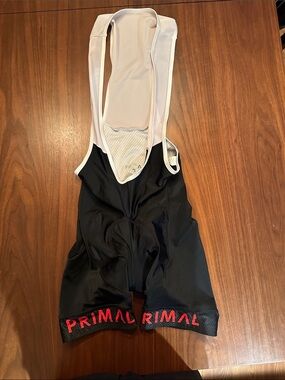 Primal Men’s Black Athletic Bib Shorts with Red Logo